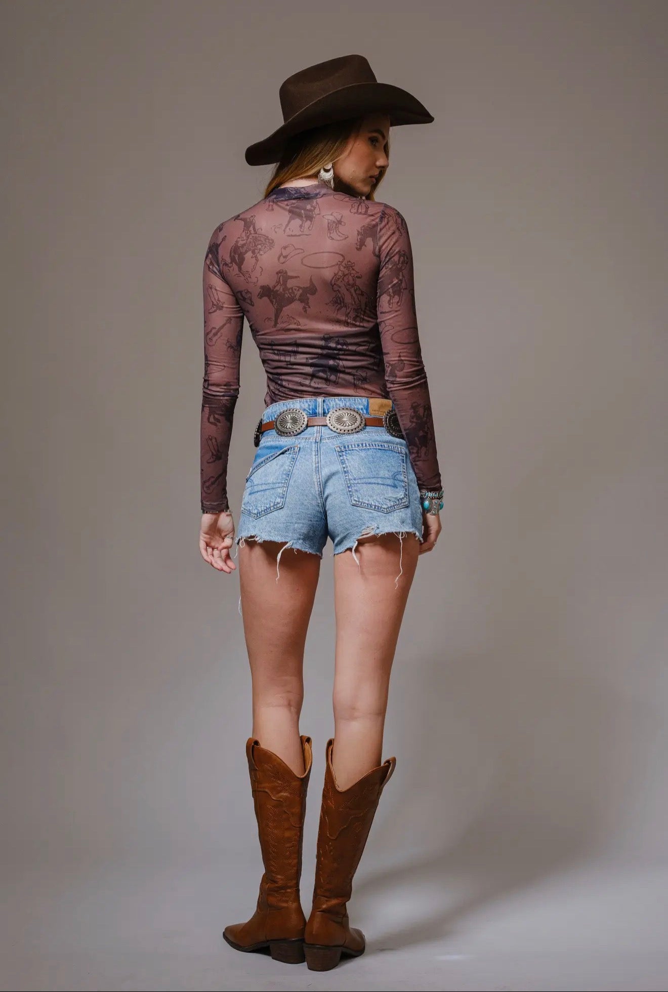 Cowgirl Print Mesh Mock
Neck Top