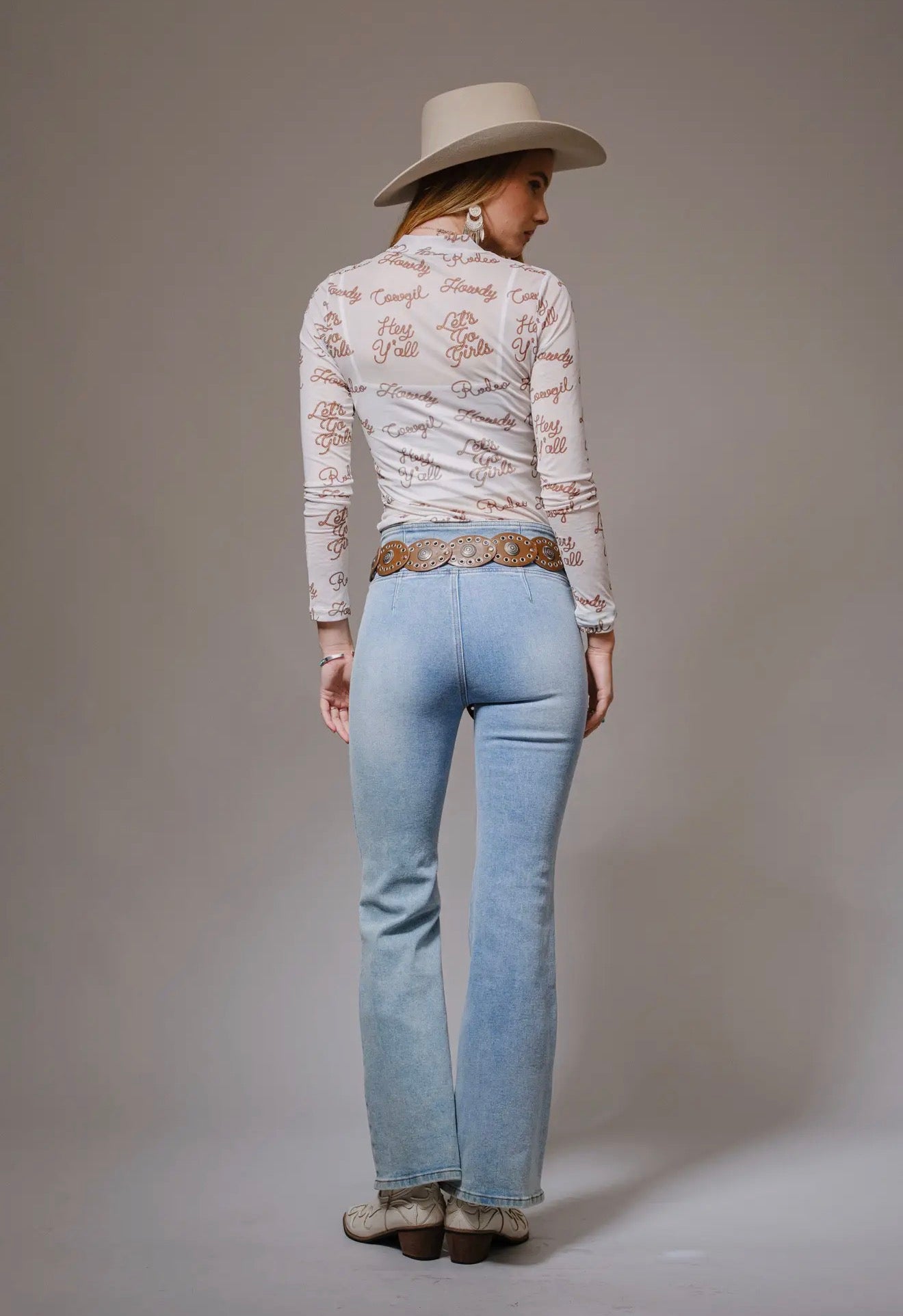 Mesh Graphic Long Sleeve Mock
Neck Top