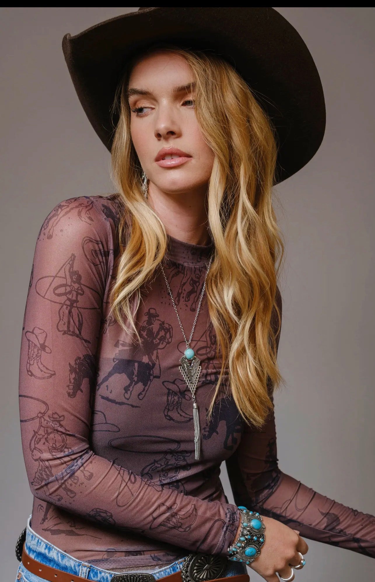 Cowgirl Print Mesh Mock
Neck Top