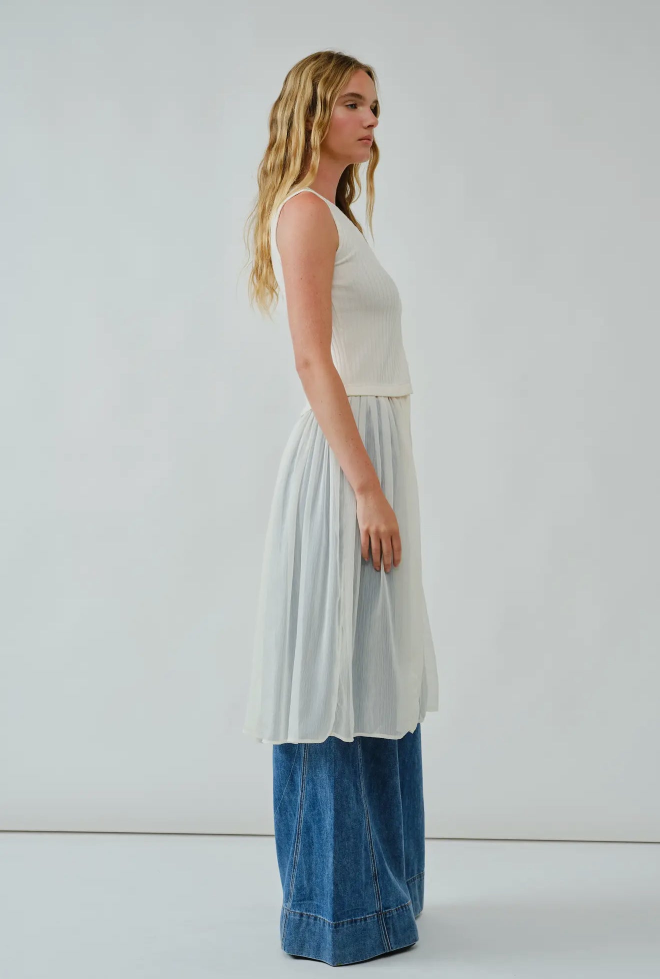 Knit Sleevless Button Down
Mixed Media