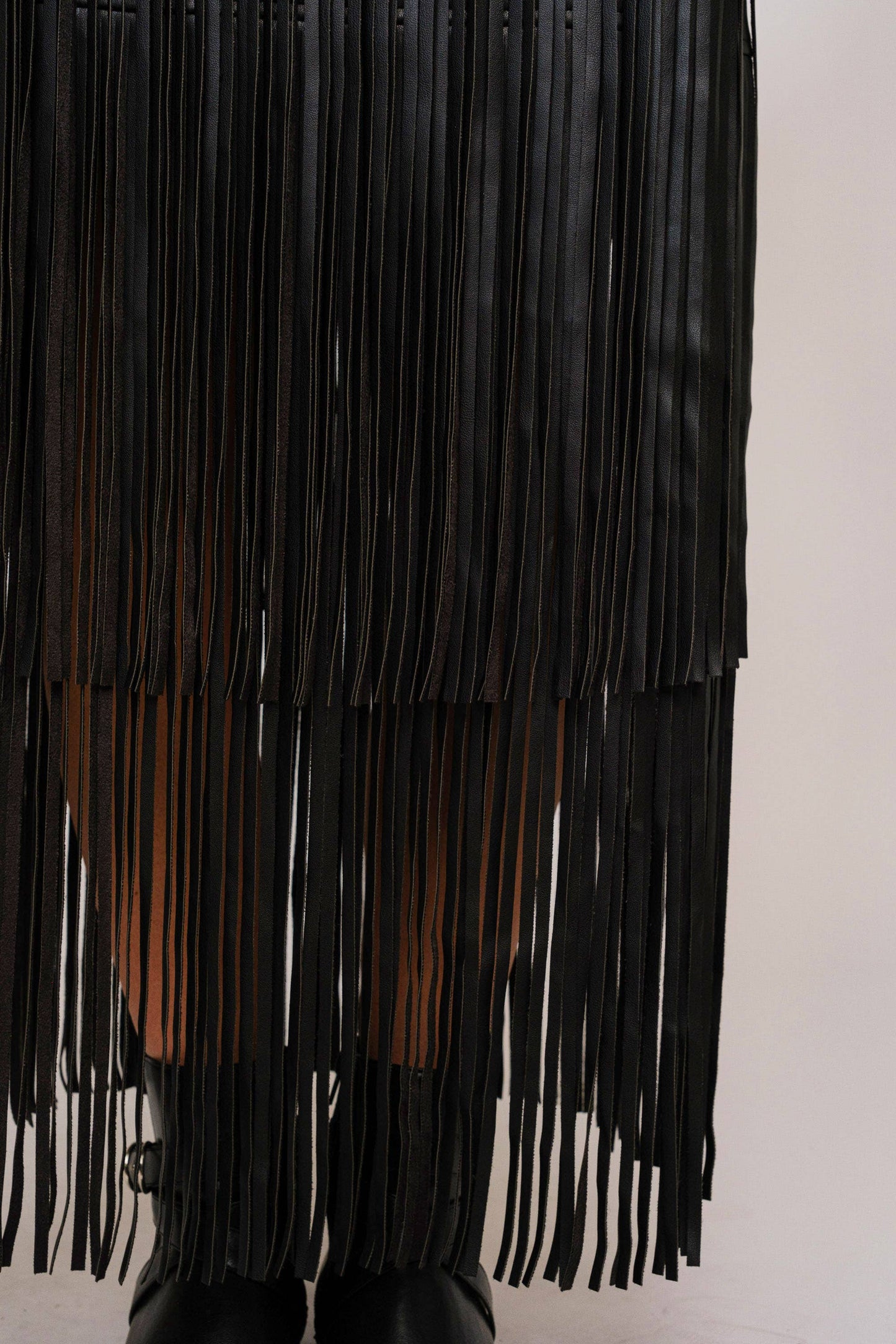 Faux Leather Tiered Fringe Maxi Skirt: Black